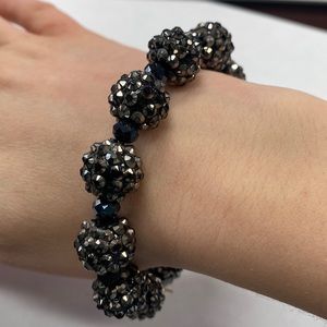 Black bracelet.